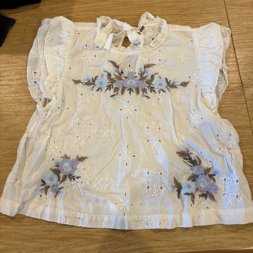Free People White Top with Blue Floral Embroidery and back keyhole cutout
